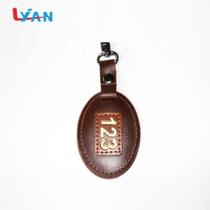 LIYAN eco-friendly metal and brown leather keychain custom logo