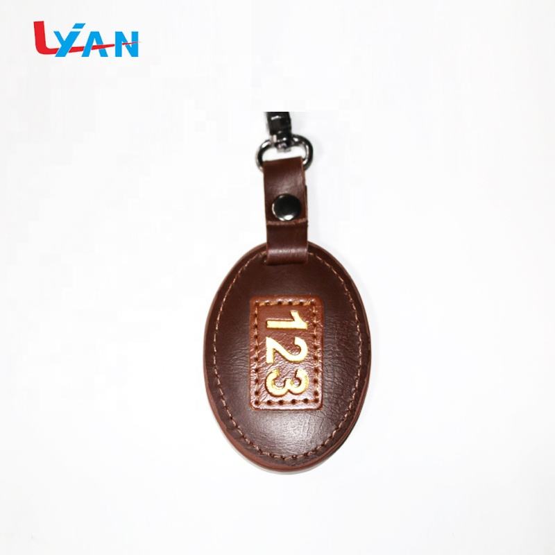LIYAN eco-friendly metal and brown leather keychain custom logo